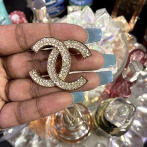 Gold Chanel brooch